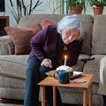 Joyce blowing out her birthday cake candle.<br />Jan. 16, 2018 - At Uldis and Edite's in Manchester by the Sea, Massachusetts.