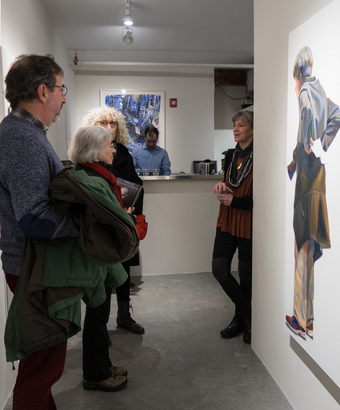 Paul, Joyce, and Dominique talking to Susan White Brown about her work.<br />Looking at art with Paul and Dominique.<br />March 9, 2018 - SoWa district, Boston, Massachusetts.