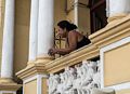 Woman on balcony.<br />Oct 30, 2016 - Santiago de Cuba.