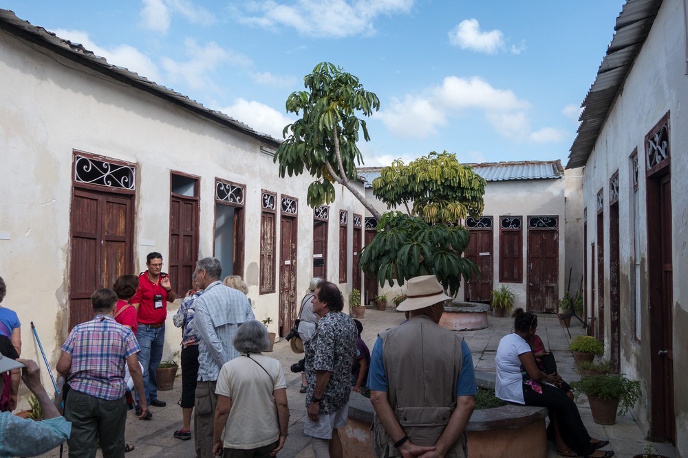 The courtyard with members of our group and Osmar.<br />"Lauro Fuentes" Community Music School <br />Nov. 1, 2016 - Santiago de Cuba.