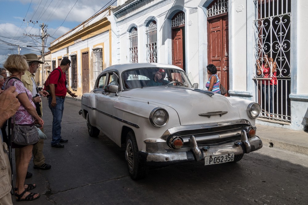 Couldn't pass up a photo of an old American car (1953 Chevy?).<br />Outside "Lauro Fuentes" Community Music School.<br />Nov. 1, 2016 - Santiago de Cuba.