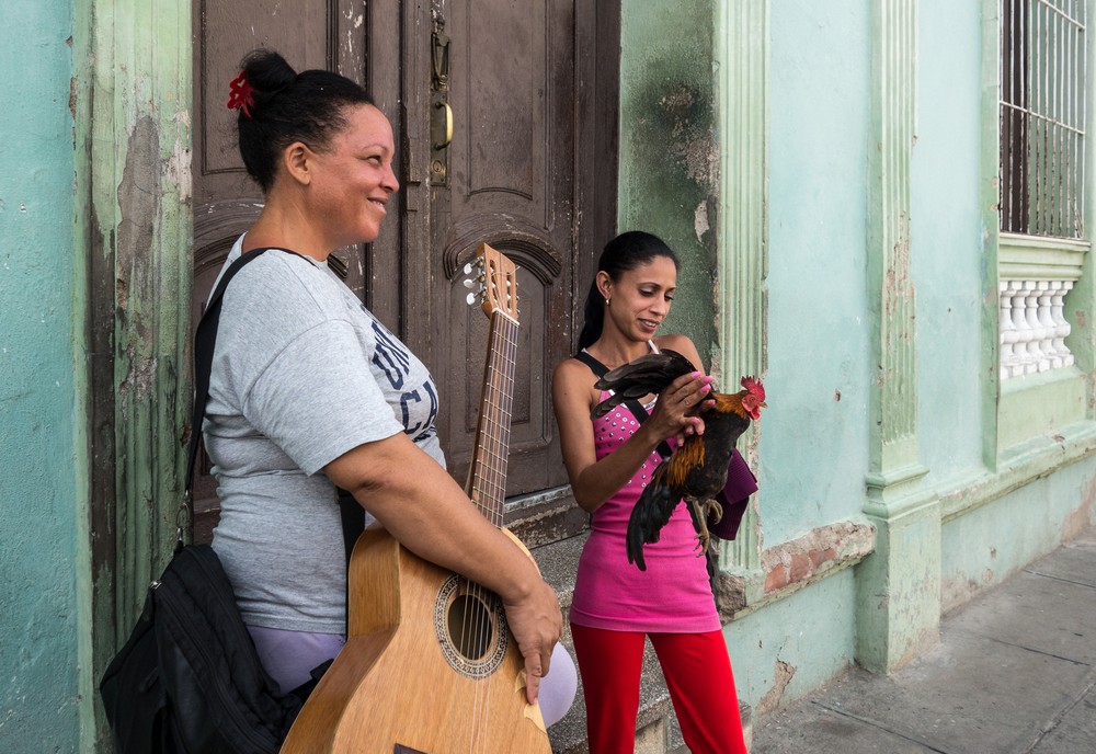 A student at "Lauro Fuentes" Community Music School and a friend.<br />Nov. 1, 2016 - Santiago de Cuba.