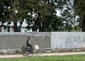 View from carriage.<br />Local man on bicycle with sidecar.<br />Nov. 2, 2016 - Bayamo, Cuba.