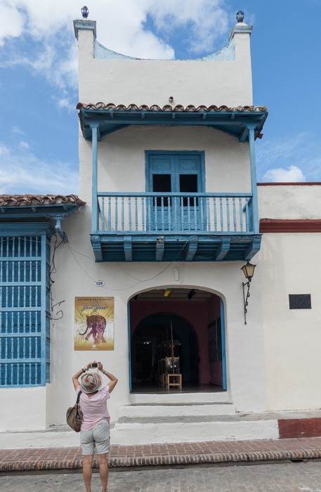 Irma photographing the art gallery building.<br />Plaza de San Juan de Dios.<br />Nov. 3, 2016 - Camag�ey, Cuba.