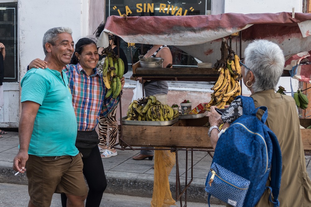 Ellen about to take a photo of street cart vendors.<br />Nov. 3, 2016 - Camag�ey, Cuba.