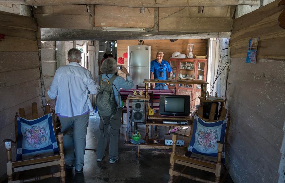 Joyce photographing Eddie in Juana's house.<br />Nov. 4, 2016 -Village near Rancho King, Camag�ey, Cuba.