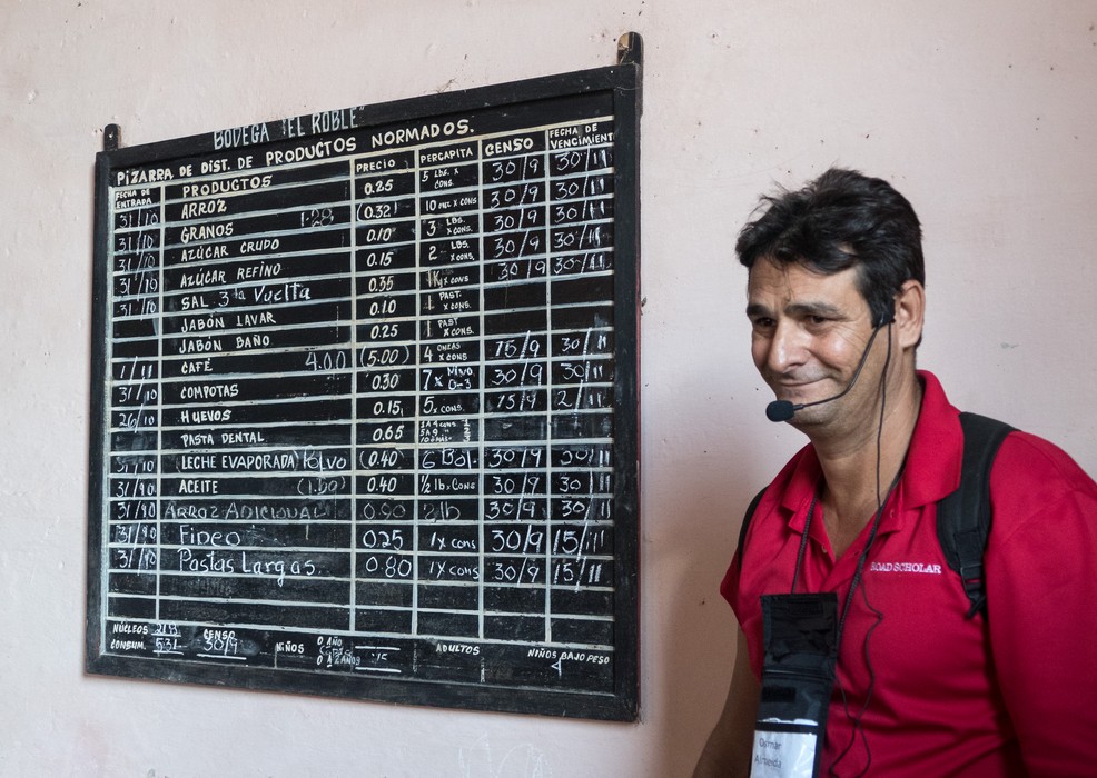 Osmar explaining the rationing store board.<br />Nov. 5, 2016 - Trinidad, Cuba.