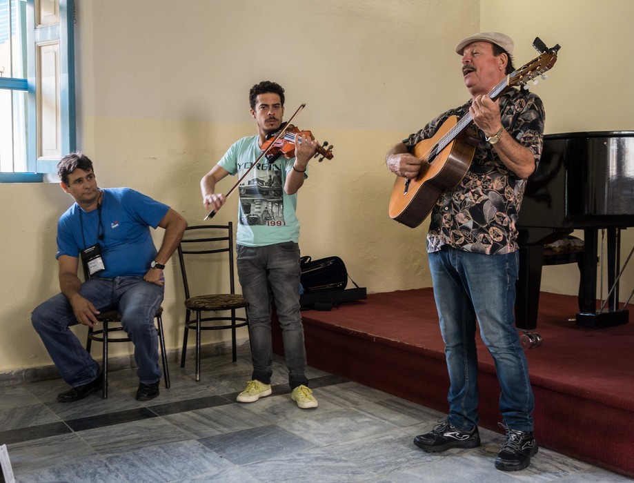 Juan Carlos Campos on guitar, his son Juan Manuel Campos on violin, and Osmar.<br />Museum of Decorative Arts.<br />Nov. 7, 2016 - Santa Clara, Cuba