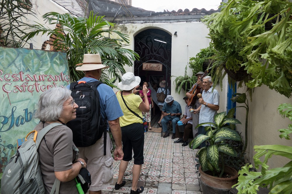 Arriving at paladar Sabore Arte, we are welcomed by the Abuelos de Fiesta.<br />Joyce and Road Scholars.<br />Nov. 7, 2016 - Santa Clara, Cuba