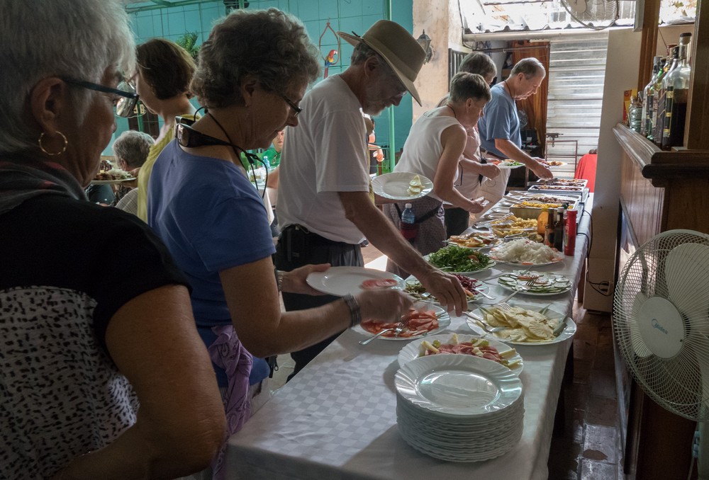 Time for lunch. Ellen, Hyatt, DJ, and others helping themselves at the buffet.<br />Nov. 7, 2016 - At the Sabore Arte paladar, Santa Clara, Cuba