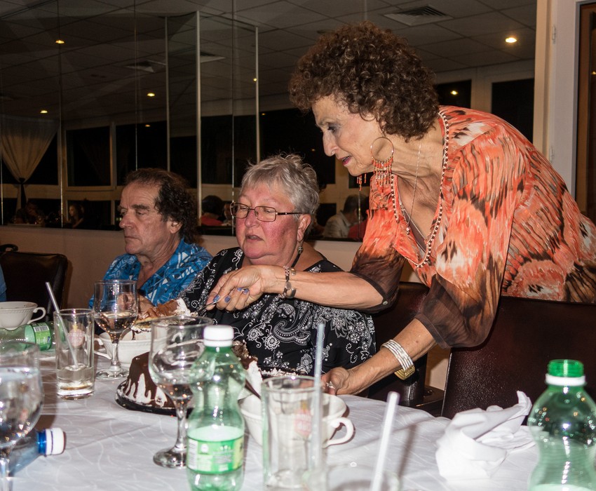 Paul, Norma, and Irma serving her own birthday cake.<br />Dinner at "La Torre" restaurant.<br />Nov. 11, 2016 - Havana, Cuba.