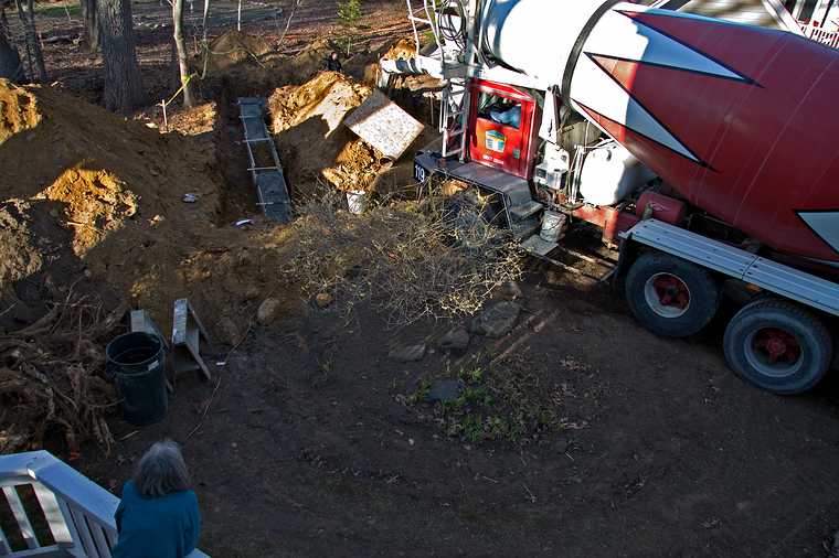 April 17, 2008 - Merrimac, Massachusetts.<br />Joyce watching the pouring of the foundation footings.