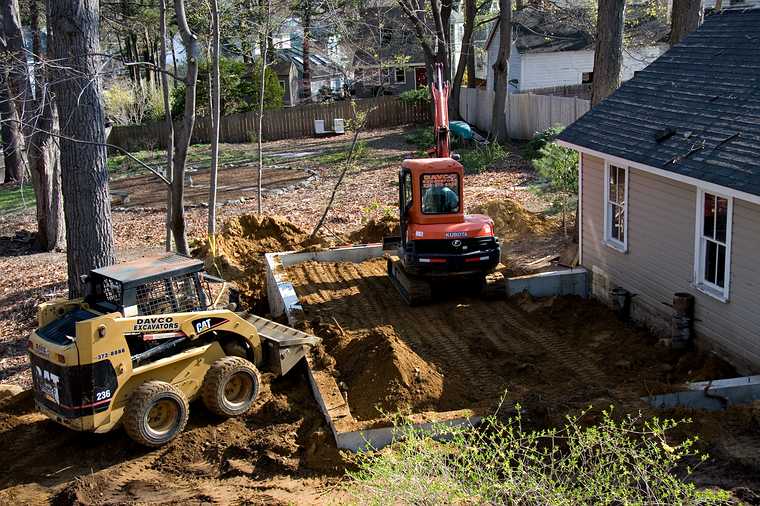 April 25, 2008 - Merrimac, Massachusetts.<br />Backfilling of the foundation for Joyce's studio.