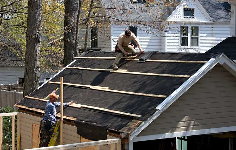 May 1, 2008 - Merrimac, Massachusetts.<br />Joyce's studio is taking shape.<br />Keith and Brian planning out the tie-in for the new roof.