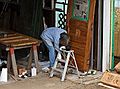 May 9, 2008 - Merrimac, Massachusetts.<br />Joyce stripping the paint off old doors to be used for her studio.