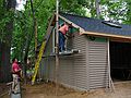 May 20, 2008 - Merrimac, Massachusetts.<br />Brian cuts the siding and Paul puts it up.