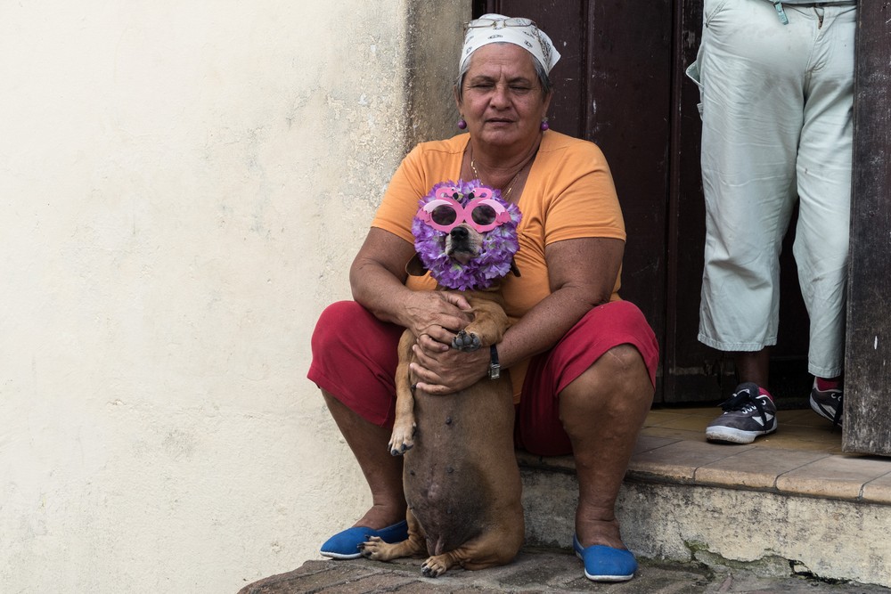 Woman and her dog.<br />Nov. 3, 2016 - Camag�ey, Cuba.